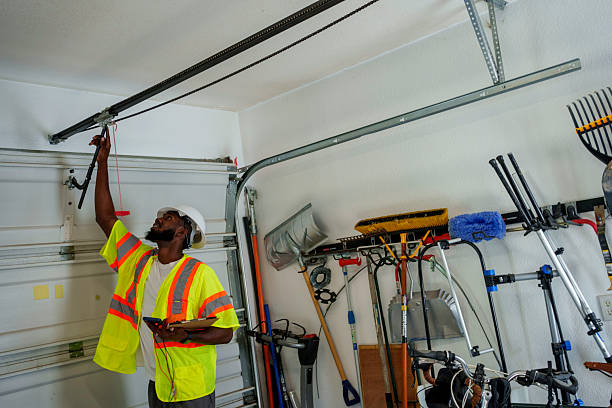 Professional Garage Door Panel Replacement technician working in Saunders Lake, OR